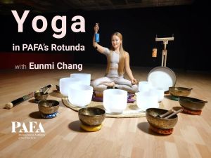 event graphic with a photo of Eunmi Chang sitting crosslegged in a leotard in a circle of Tibetan Singing Bowls and crystal bowls and holding a bowl up with one hand at head-height. 