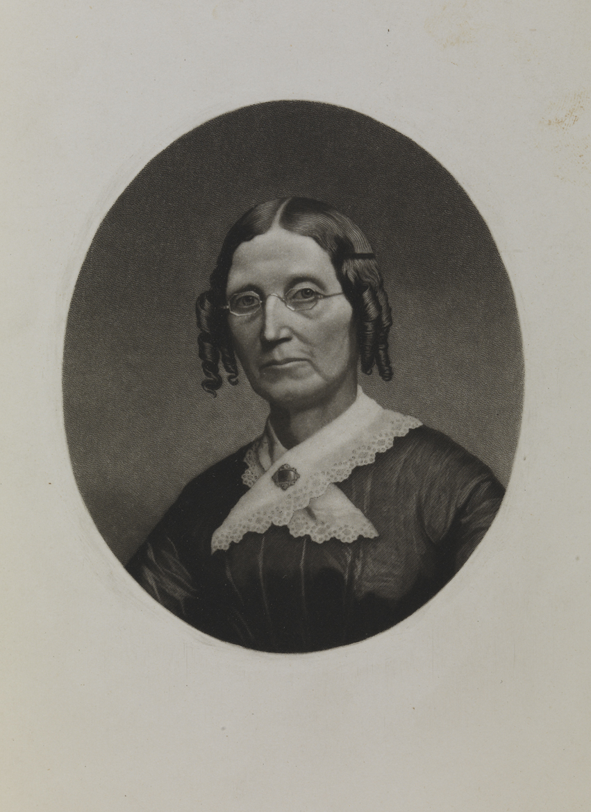 [Woman with finger curls and glasses]