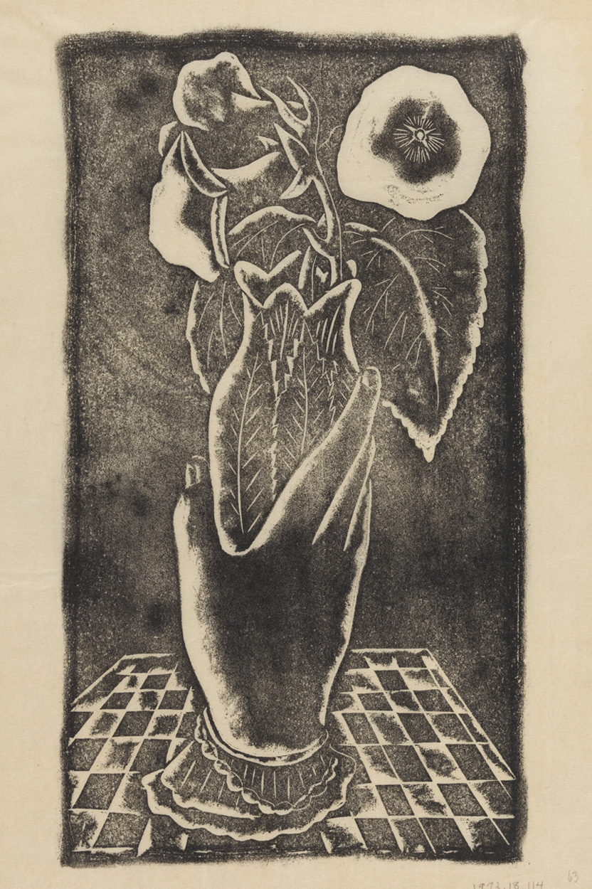 [Ceramic hand vase with flowers]