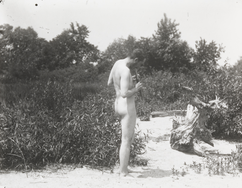 Thomas Eakins nude, playing pipes, facing right