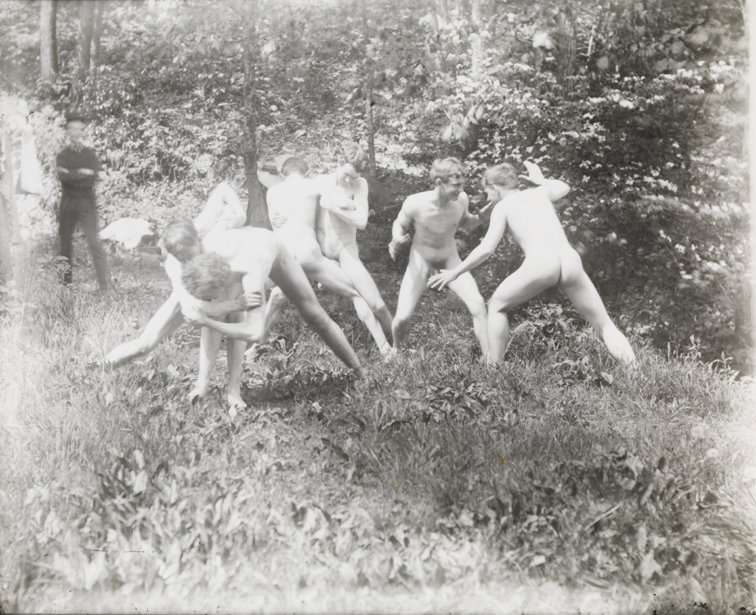 Six males, nude, wrestling