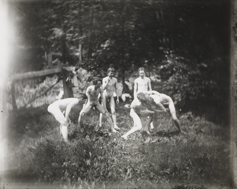 Six males, nude, two wrestling at right