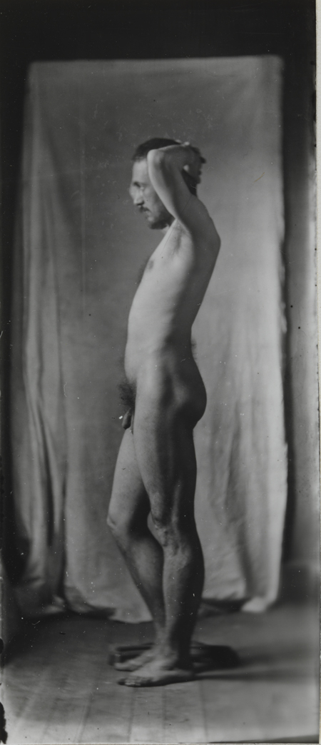 Naked series: Thomas Eakins in front of cloth backdrop, pose 2