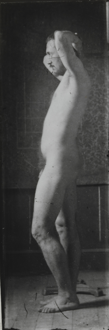 Naked series: Thomas Eakins in front of wallpaper backdrop, pose 3