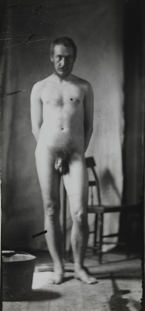 Naked series: Thomas Eakins with chair in front of cloth backdrop, pose 5