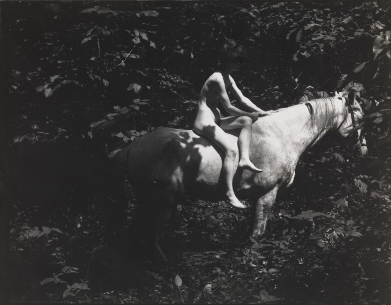Susan Macdowell Eakins nude, sitting sidesaddle on Thomas Eakins's horse Billy (face obliterated)