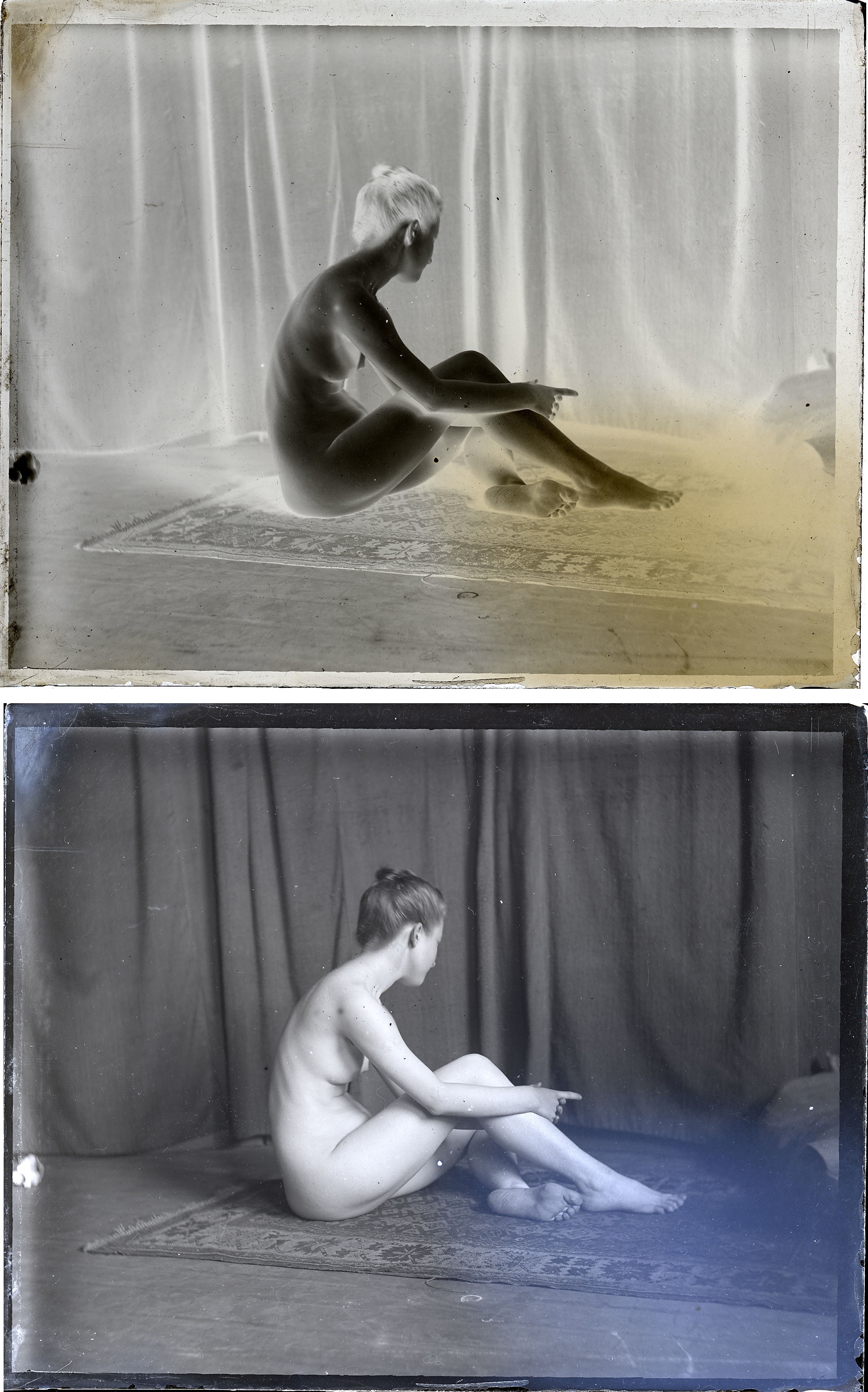 Female nude sitting on floor, grasping left leg, index finger pointed