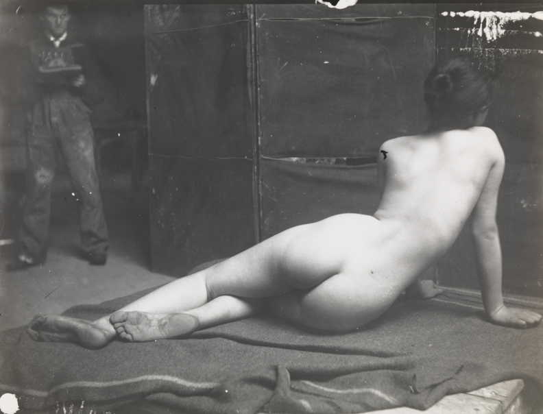 Female nude semireclining, from rear