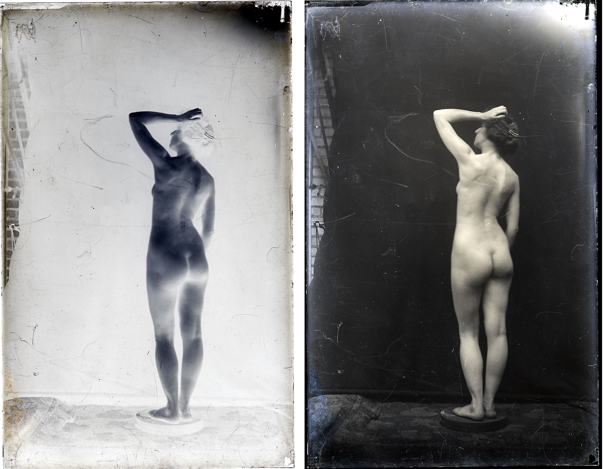 Female nude standing on a small round pedestal, from rear