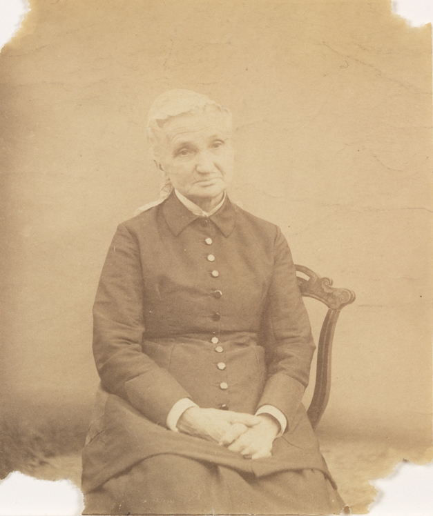 Unidentified woman sitting