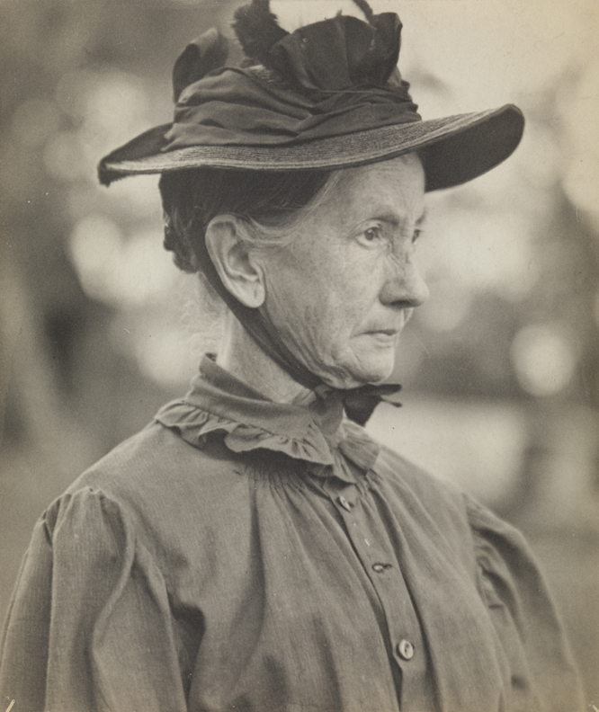 Unidentified woman with hat, facing right