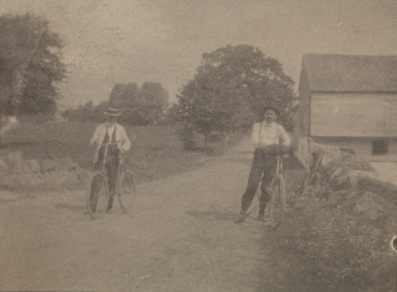 Benjamin Eakins and Samuel Murray with bicycles