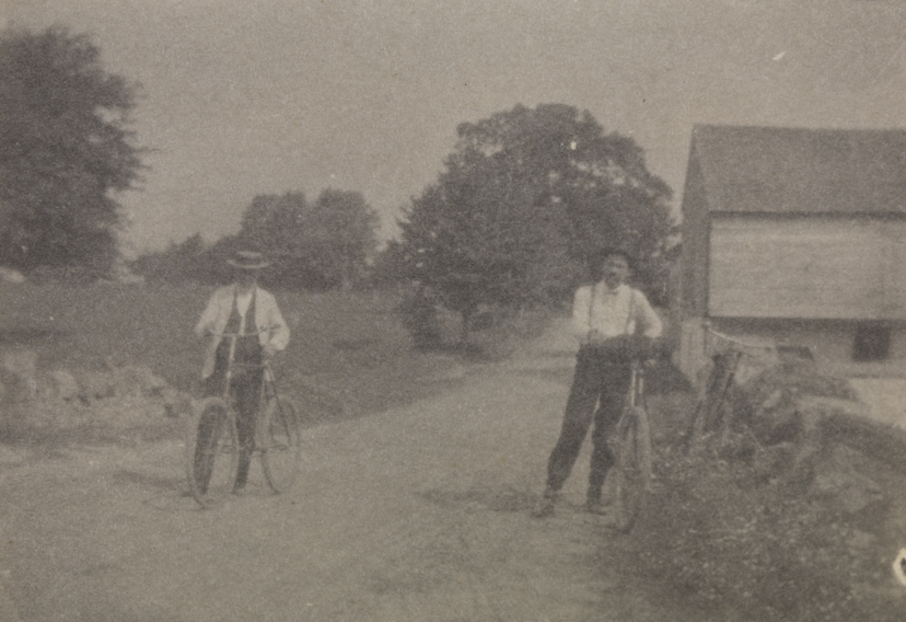 Benjamin Eakins and Samuel Murray with bicycles
