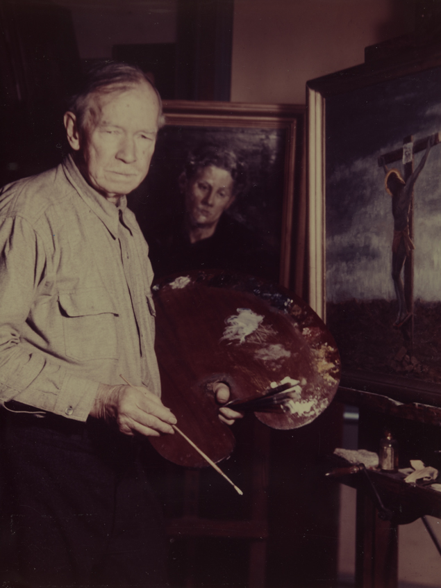 Charles Bregler with palette and paintings