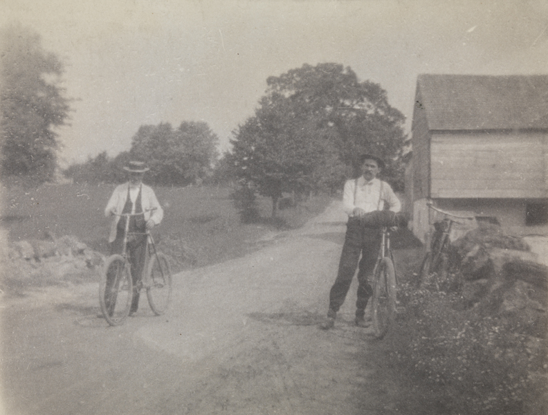 Benjamin Eakins and Samuel Murray with bicycles