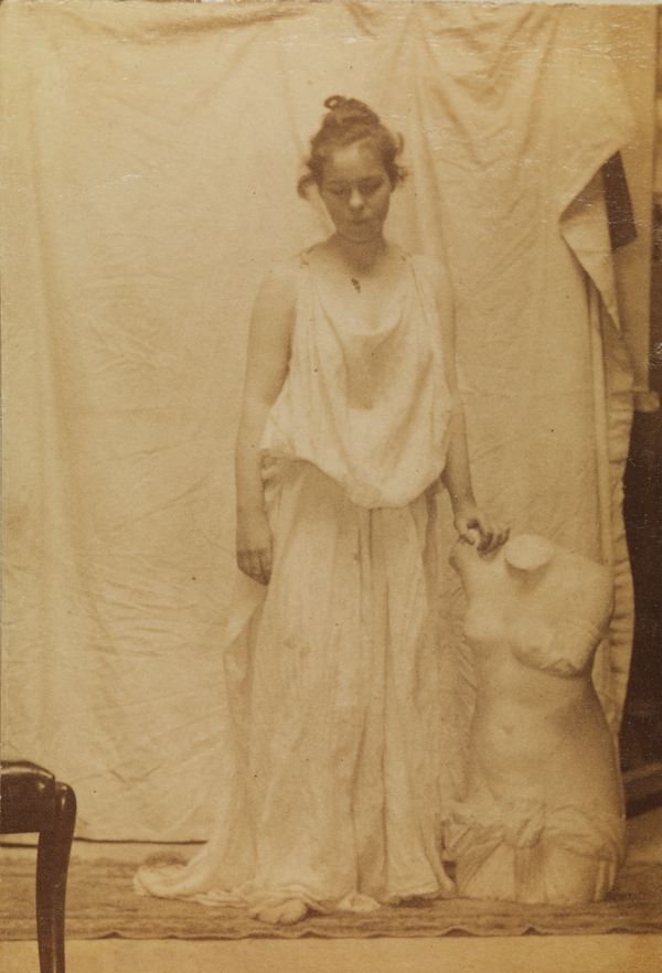 Weda Cook in classical costume with Venus torso