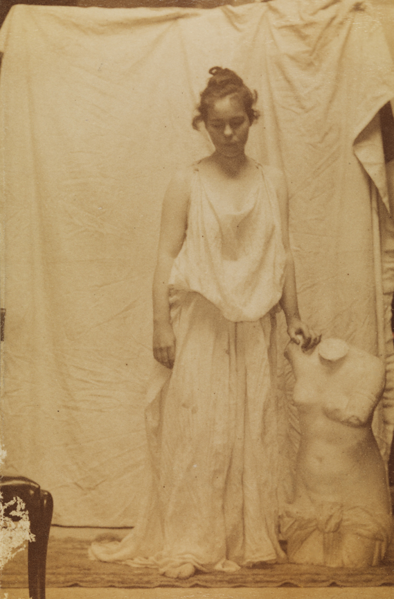 Weda Cook in classical costume with Venus torso