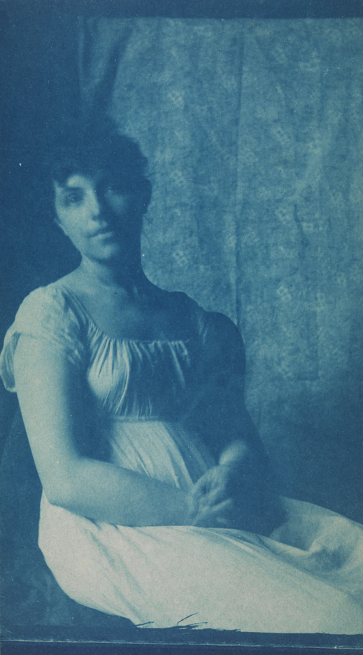 Unidentified female seated in classical costume