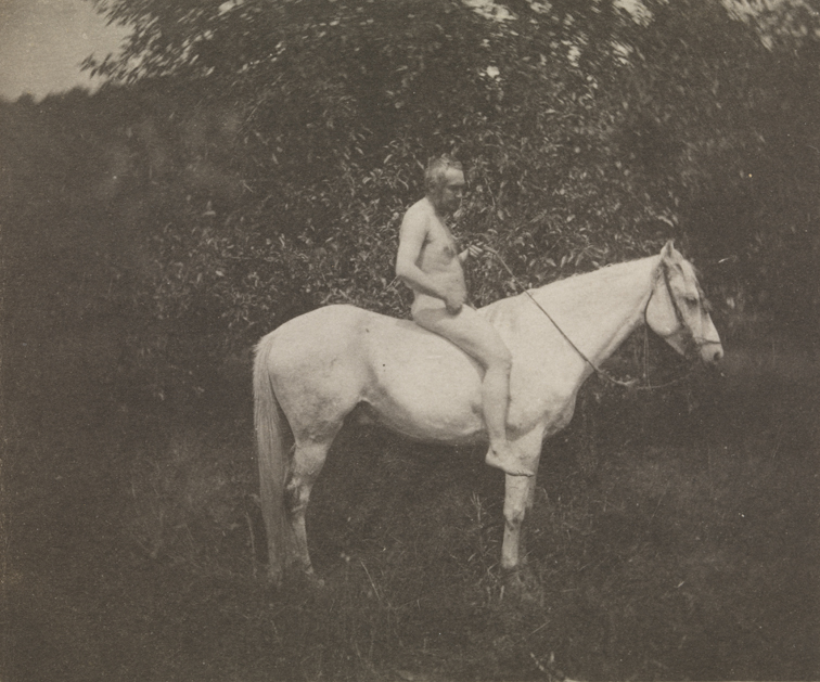 Thomas Eakins nude, facing right, on his horse Billy
