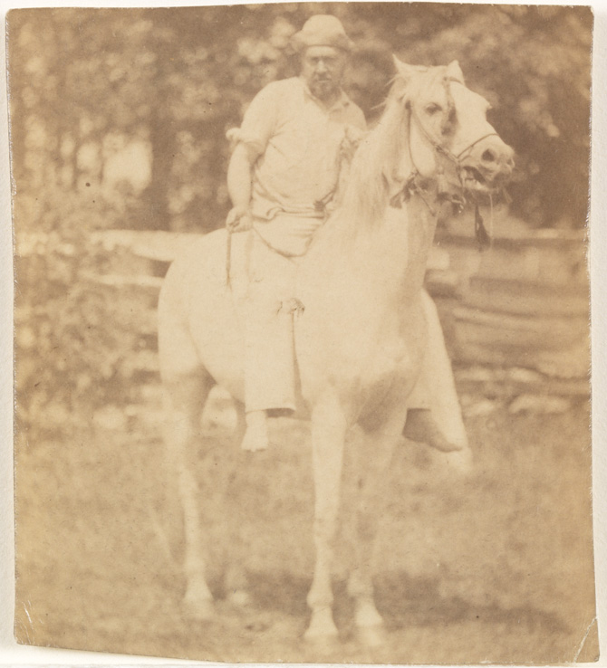 Thomas Eakins with white hat, riding his horse Billy