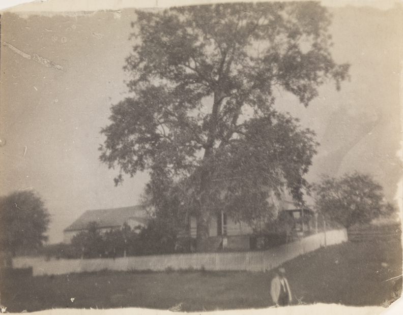 William J. Crowell's home with Benjamin Eakins in foreground, at Avondale, Pennsylvania