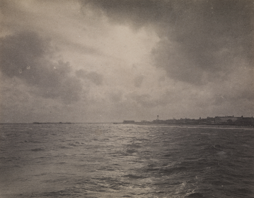 View of ocean with shoreline in distance