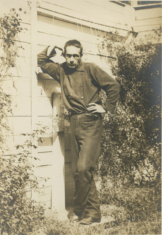 Thomas Eakins at about thirty-five, leaning against fence