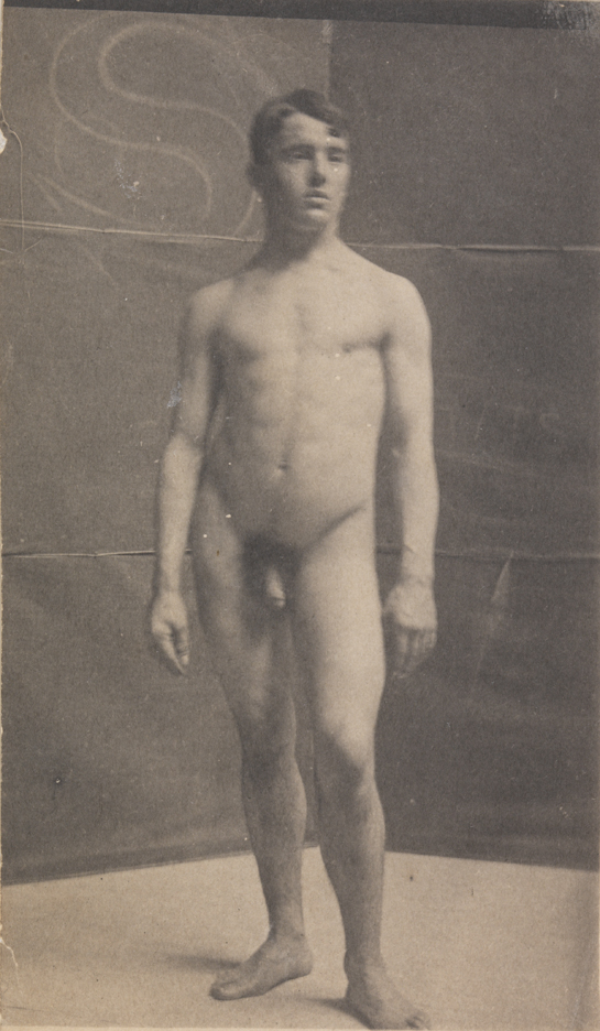 Tom Eagan nude, in front of folding screen