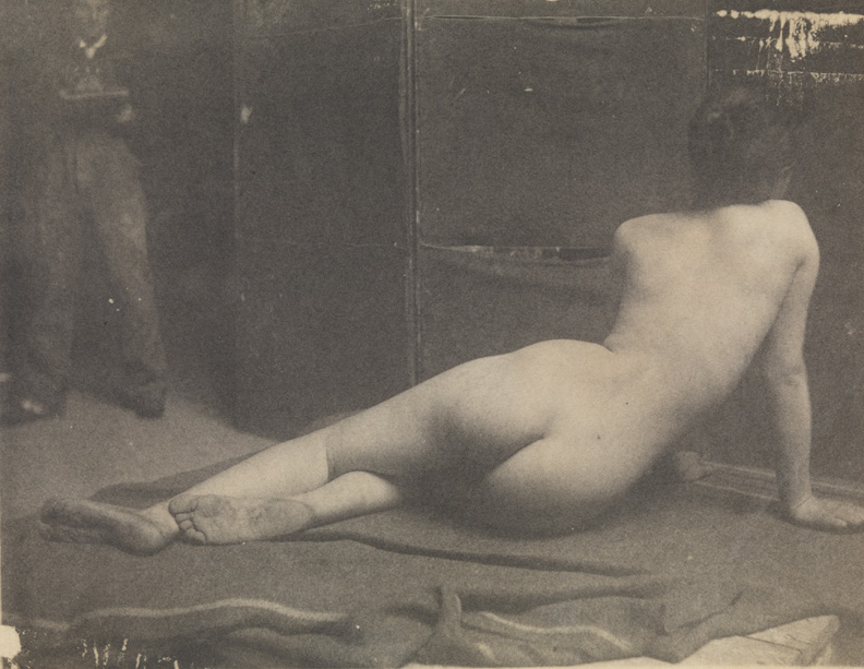 Female nude semireclining, from rear