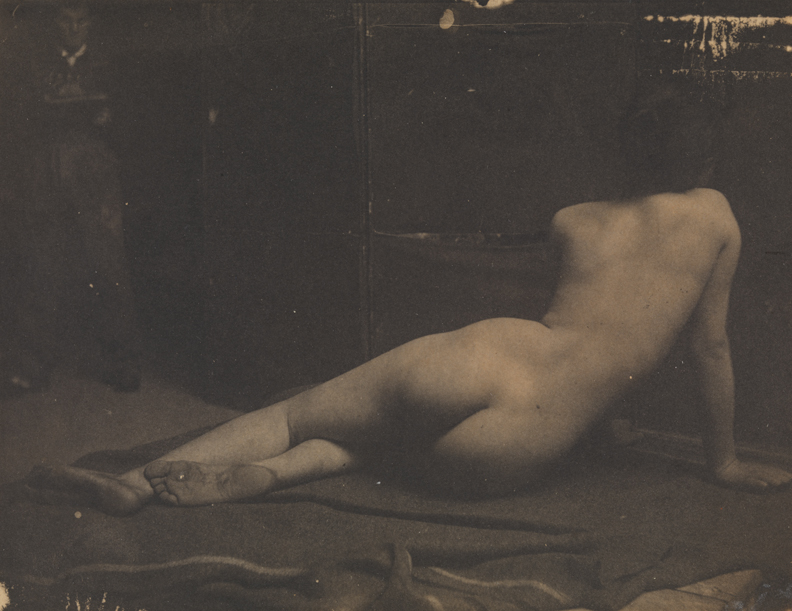 Female nude semireclining, from rear