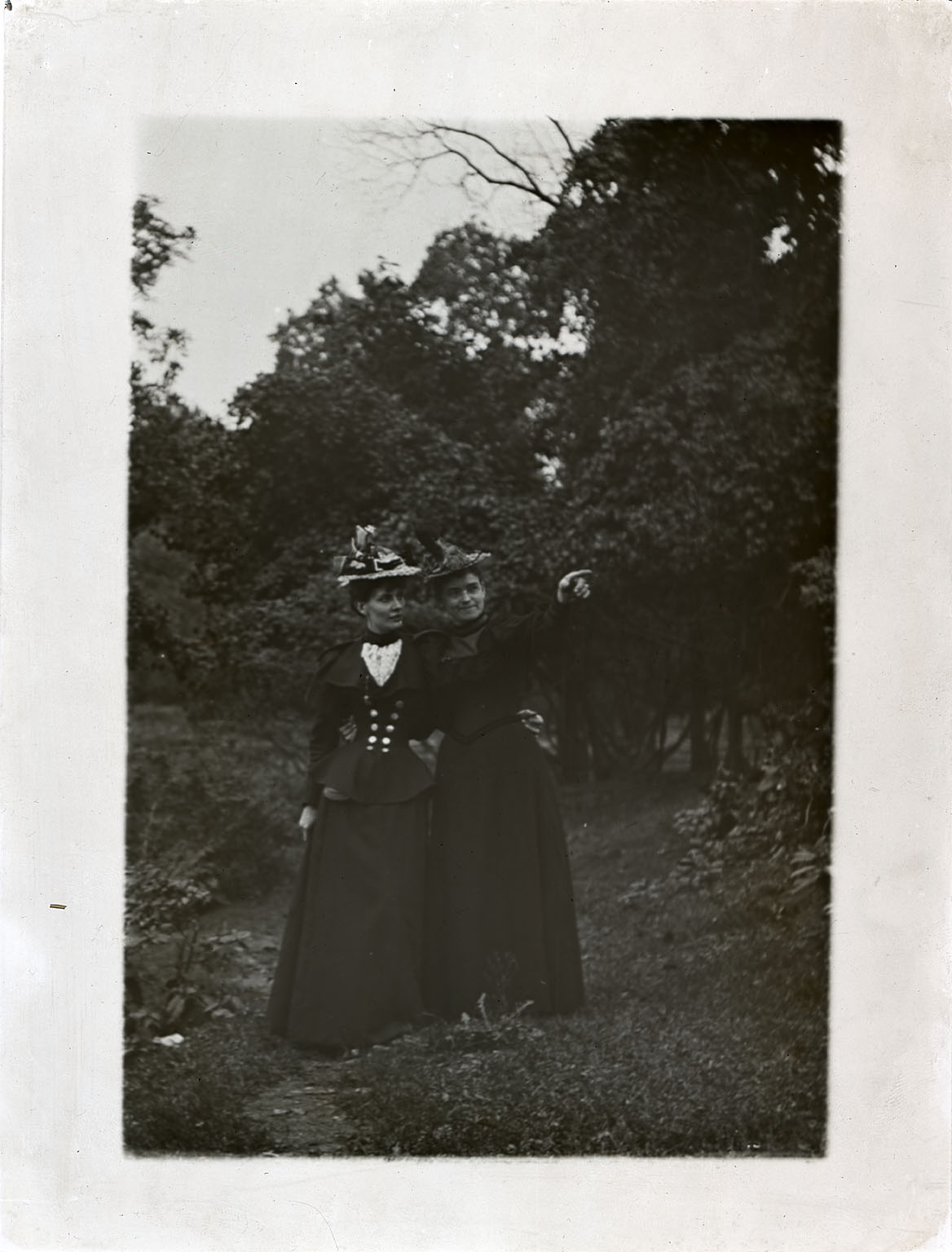 Elizabeth Bregler and unidentified woman in wooded landscape
