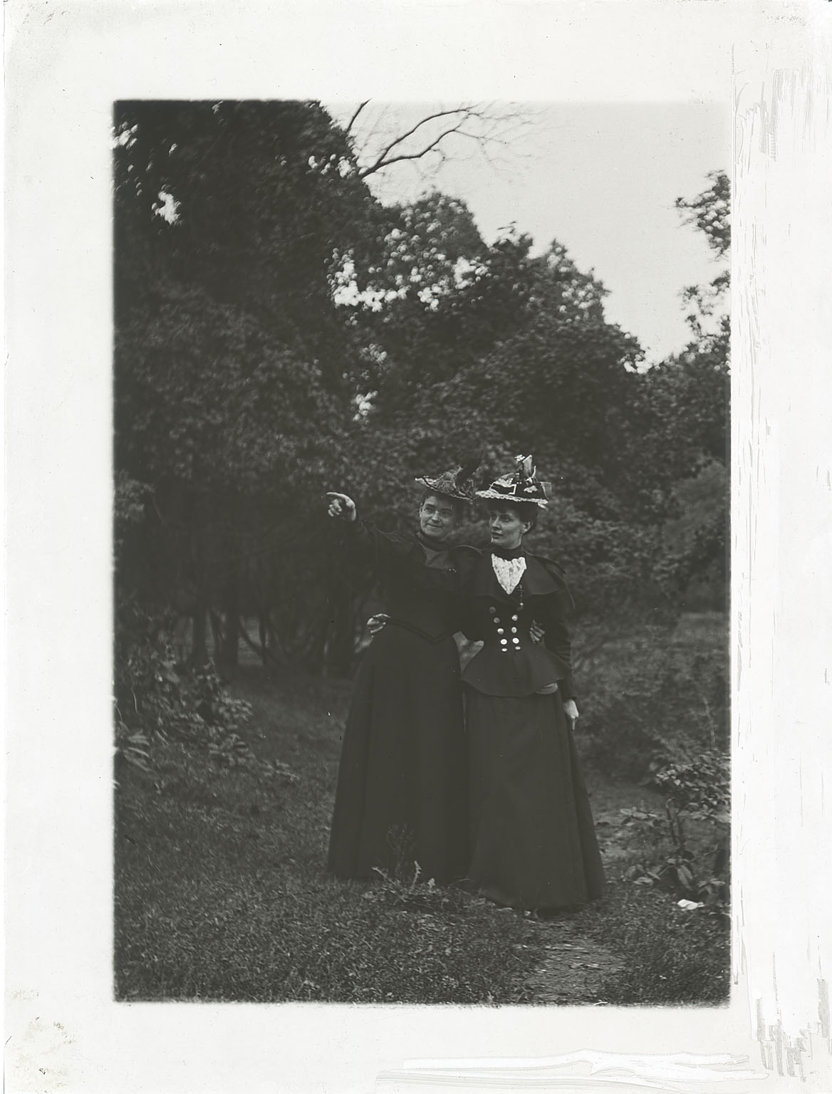 Elizabeth Bregler and unidentified woman in wooded landscape