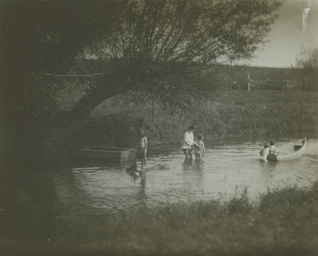 Susan Macdowell and Crowell children with rowboat in creek at Avondale, Pennsylvania