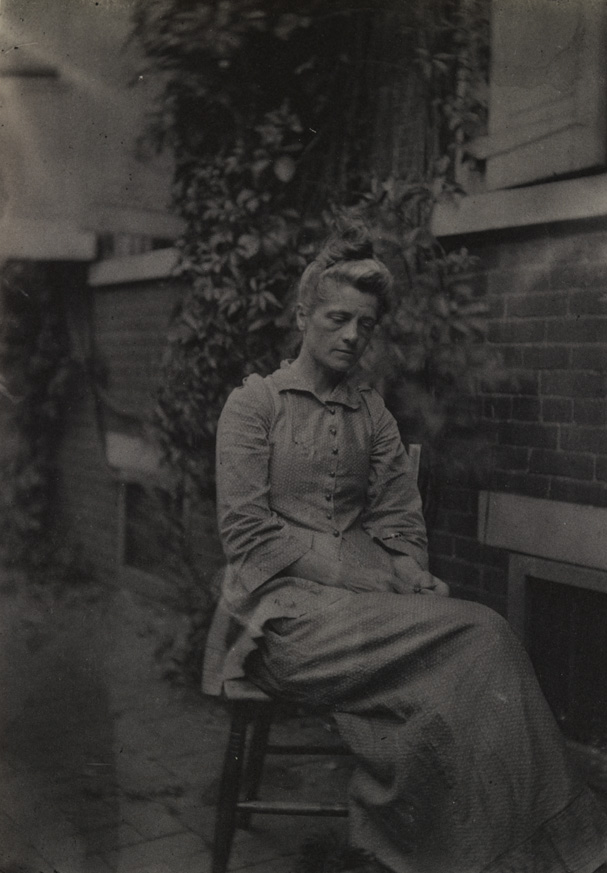 Susan Macdowell Eakins sitting in yard of the family home at 1729 Mount Vernon Street, Philadelphia