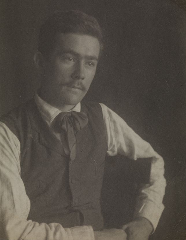 Samuel Murray sitting, looking right