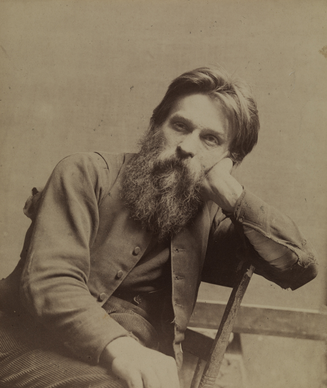 Franklin Schenck sitting, resting head on hand