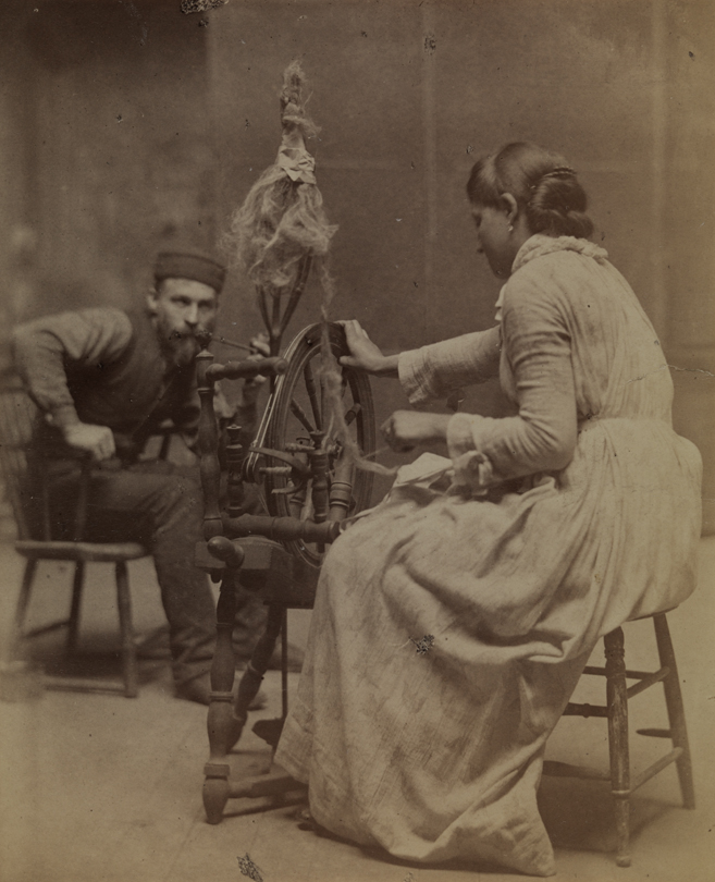 Female model spinning while man watches