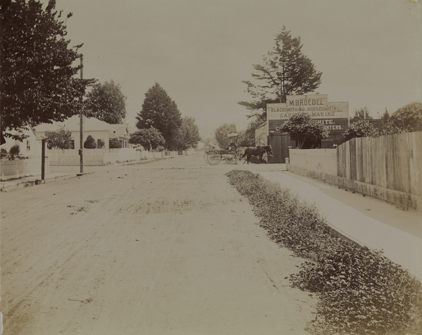 Unidentified street scene in U. S., blacksmith's shop