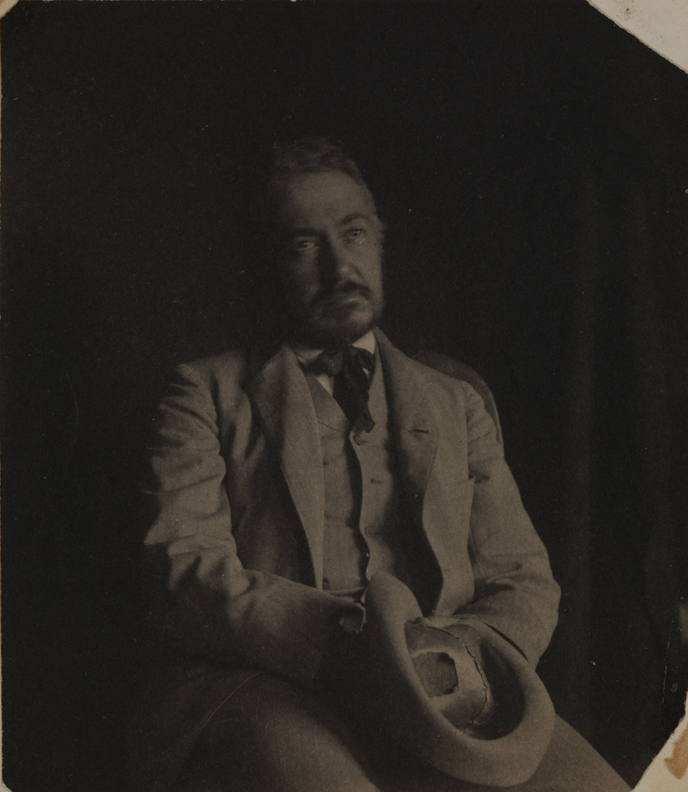 Thomas Eakins sitting, hat in hand