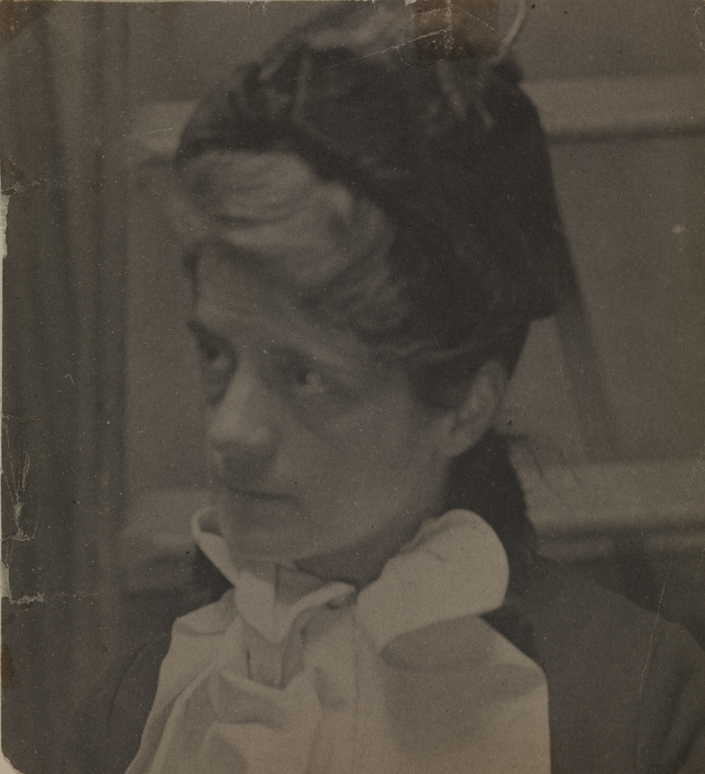 Susan Macdowell Eakins, facing left, wearing hat