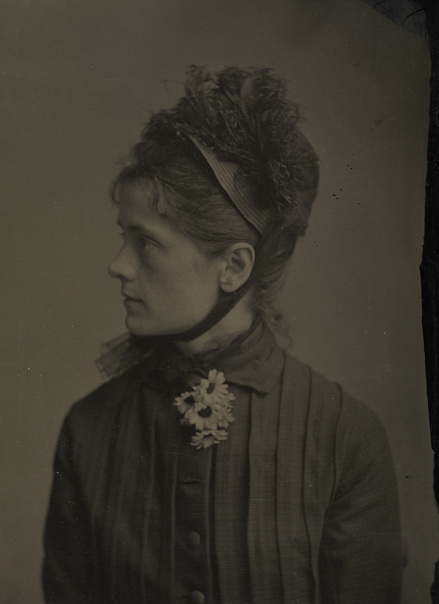 Susan Macdowell Eakins with daisies in buttonhole