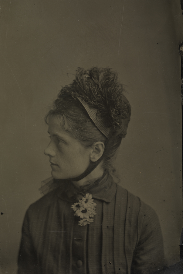 Susan Macdowell Eakins with daisies in buttonhole