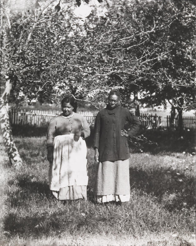 Two African-American women standing outdoors