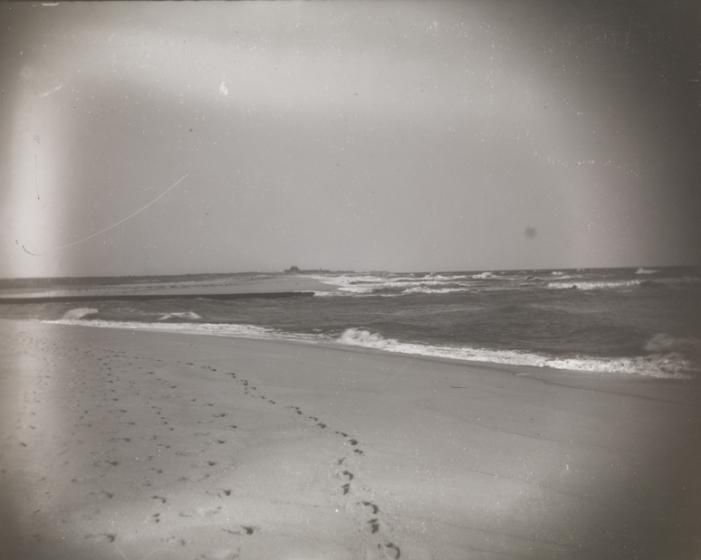 Beach with Beach House Hotel in distance, at Manasquan, New Jersey                        
