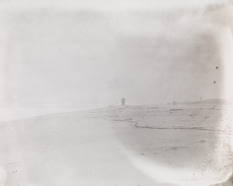 Beach in fog, with figures in distance, at Manasquan, New Jersey
