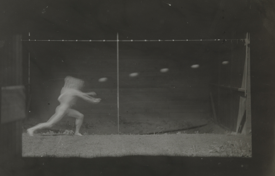 Motion study: male nude, throwing a flat object to right