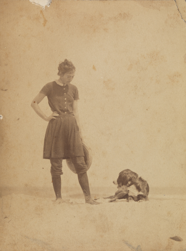 Margaret Eakins with Thomas Eakins's setter Harry at beach