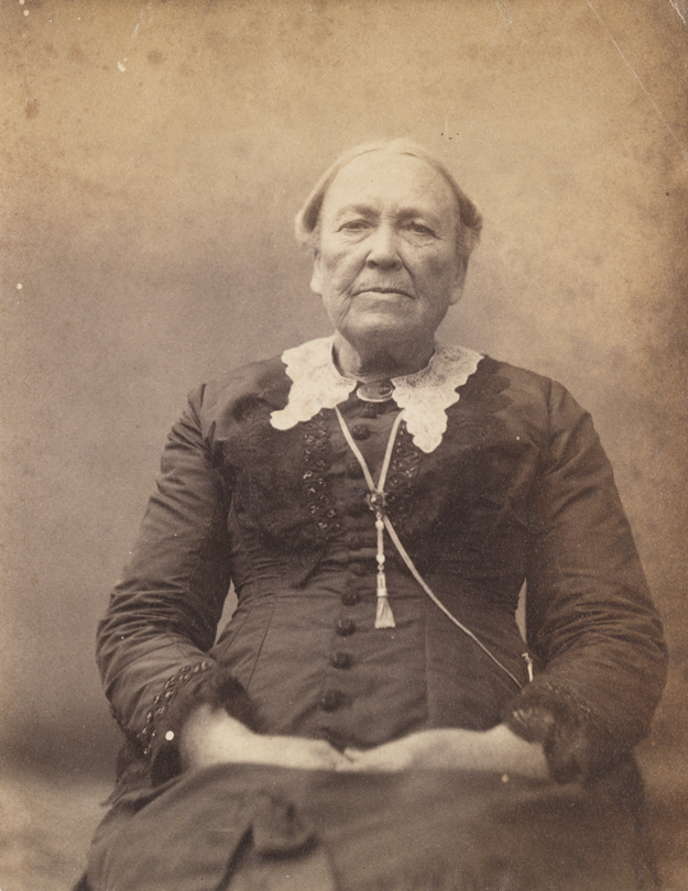 Unidentified woman sitting