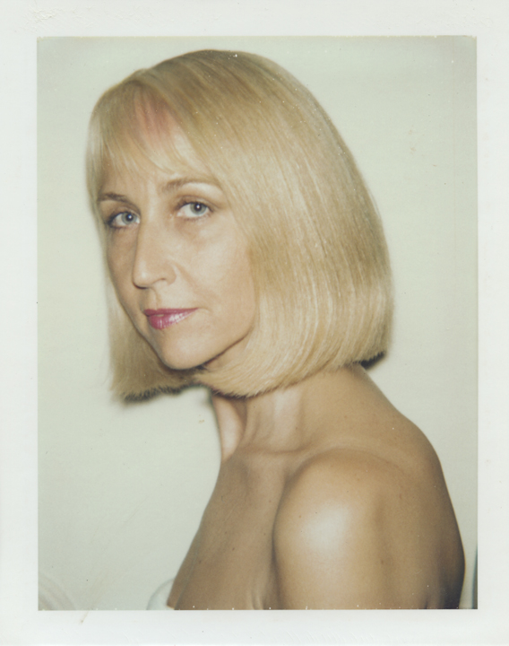 Unidentified Woman (Blonde, bangs)