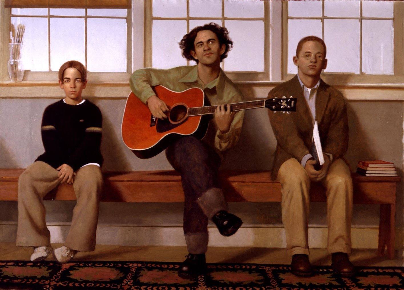A diverse trio sits on a bench indoors. The center person plays an acoustic guitar, exuding calmness. The left looks pensive, while the right clutches a book, appearing thoughtful. The background features large windows.